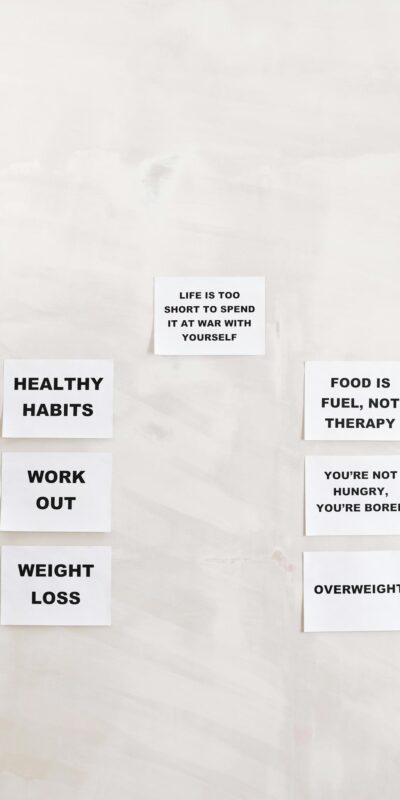 Collection of quotes promoting healthy habits and weight loss for a balanced lifestyle.