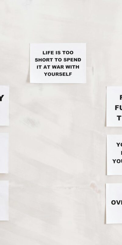 Minimalist display of motivational health and wellness quotes emphasizing healthy habits and weight management.